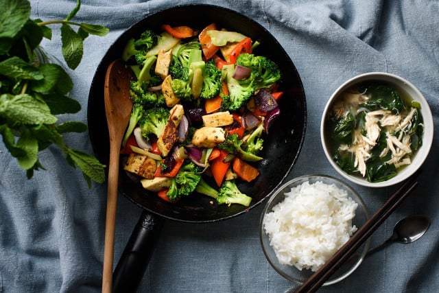 A bowl of tofu with vegetables and brown rice is a choline-rich meal.