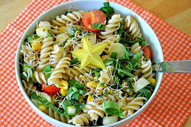 You can make a light but filling summer salad with pasta as a base.