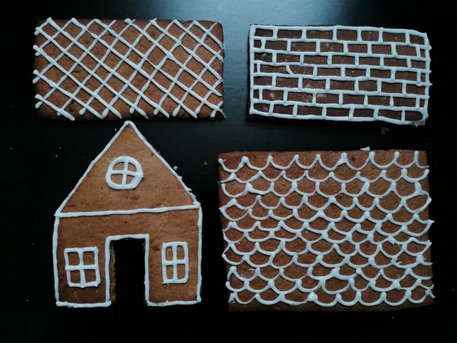 mit-einem-spritzbeutel-kannst-du-beliebige-muster-mia-stremme-utopia-211109_download Mit einem Spritzbeutel kannst du beliebige Muster auf das Lebkuchenhaus malen.