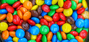 m&m milka schoko bons insekten läuse schildlaus schellack karminrot