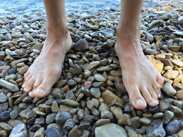 If you walk barefoot on stones, it is like a foot massage.