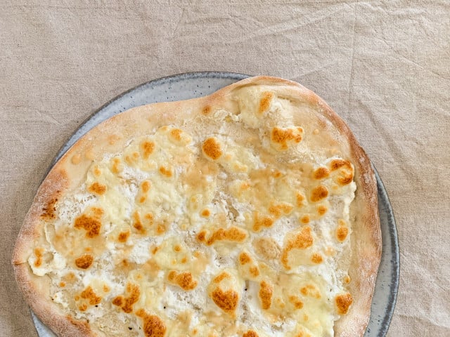 Pizza Bianca tastes best with homemade dough.