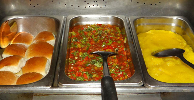 Traditional pav bread with vegetable curry: A typical breakfast in India.