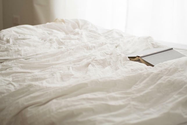 In order to avoid bedtime procrastination, you should impose clear rules - like no smartphone in the bedroom.